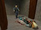Dead zombie and security guard looks on